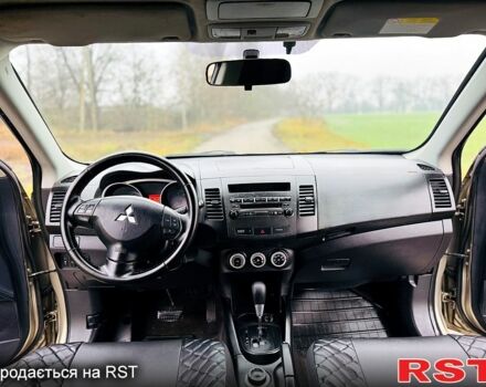 Бежевый Мицубиси Аутлендер, объемом двигателя 2.4 л и пробегом 107 тыс. км за 9900 $, фото 6 на Automoto.ua