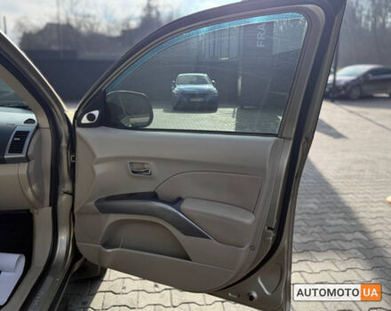 Бежевий Міцубісі Аутлендер, об'ємом двигуна 2.4 л та пробігом 195 тис. км за 8500 $, фото 20 на Automoto.ua