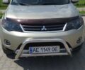 Бежевый Мицубиси Аутлендер, объемом двигателя 2.4 л и пробегом 270 тыс. км за 9500 $, фото 1 на Automoto.ua