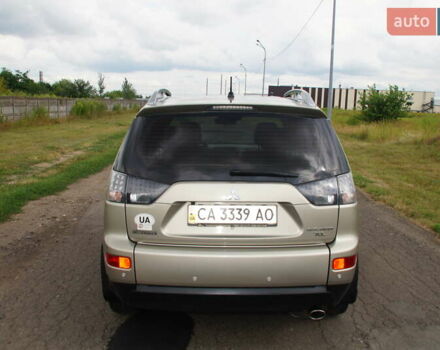 Бежевий Міцубісі Аутлендер, об'ємом двигуна 2.36 л та пробігом 207 тис. км за 10800 $, фото 27 на Automoto.ua