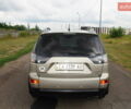 Бежевий Міцубісі Аутлендер, об'ємом двигуна 2.36 л та пробігом 207 тис. км за 10800 $, фото 27 на Automoto.ua