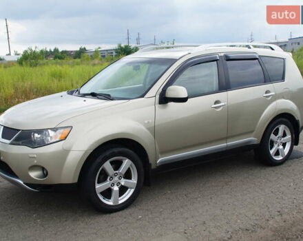 Бежевий Міцубісі Аутлендер, об'ємом двигуна 2.36 л та пробігом 207 тис. км за 10800 $, фото 4 на Automoto.ua