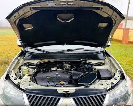 Бежевый Мицубиси Аутлендер, объемом двигателя 2.4 л и пробегом 107 тыс. км за 9900 $, фото 13 на Automoto.ua