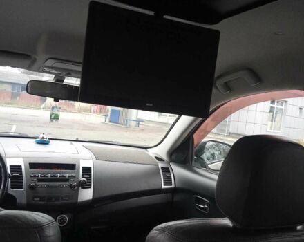 Бежевий Міцубісі Аутлендер, об'ємом двигуна 2.4 л та пробігом 290 тис. км за 6800 $, фото 7 на Automoto.ua