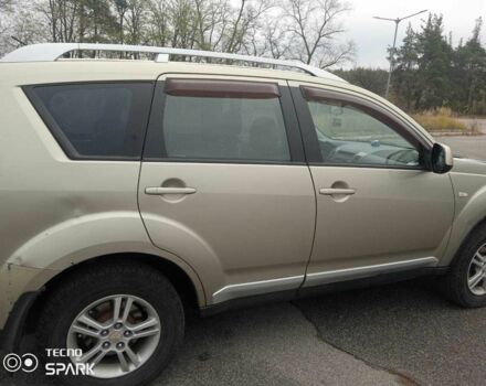 Бежевий Міцубісі Аутлендер, об'ємом двигуна 2.4 л та пробігом 290 тис. км за 6800 $, фото 3 на Automoto.ua