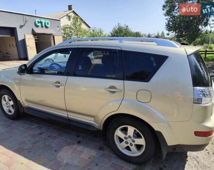Бежевый Мицубиси Аутлендер, объемом двигателя 2.36 л и пробегом 281 тыс. км за 8500 $, фото 4 на Automoto.ua