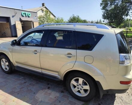 Бежевий Міцубісі Аутлендер, об'ємом двигуна 2.4 л та пробігом 281 тис. км за 8500 $, фото 4 на Automoto.ua