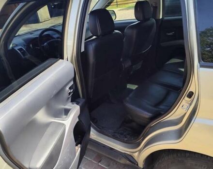 Бежевый Мицубиси Аутлендер, объемом двигателя 2.36 л и пробегом 281 тыс. км за 8500 $, фото 10 на Automoto.ua