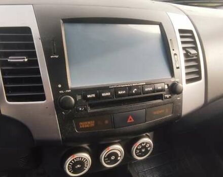 Бежевый Мицубиси Аутлендер, объемом двигателя 2.36 л и пробегом 200 тыс. км за 8300 $, фото 26 на Automoto.ua