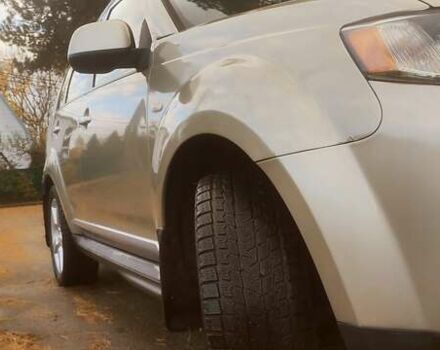 Бежевий Міцубісі Аутлендер, об'ємом двигуна 2.36 л та пробігом 240 тис. км за 9250 $, фото 3 на Automoto.ua