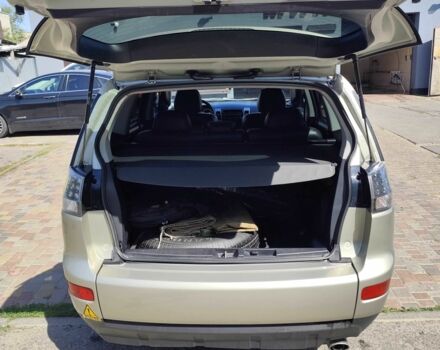 Бежевий Міцубісі Аутлендер, об'ємом двигуна 2.4 л та пробігом 281 тис. км за 8500 $, фото 9 на Automoto.ua