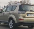 Бежевый Мицубиси Аутлендер, объемом двигателя 2.36 л и пробегом 200 тыс. км за 8300 $, фото 3 на Automoto.ua