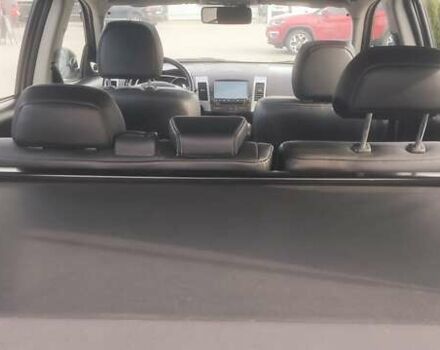 Бежевый Мицубиси Аутлендер, объемом двигателя 2.36 л и пробегом 200 тыс. км за 8300 $, фото 35 на Automoto.ua