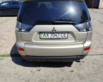 Бежевий Міцубісі Аутлендер, об'ємом двигуна 2.4 л та пробігом 281 тис. км за 8500 $, фото 5 на Automoto.ua