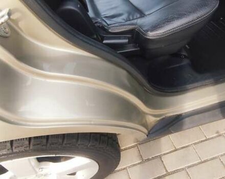 Бежевый Мицубиси Аутлендер, объемом двигателя 2.36 л и пробегом 200 тыс. км за 8300 $, фото 48 на Automoto.ua