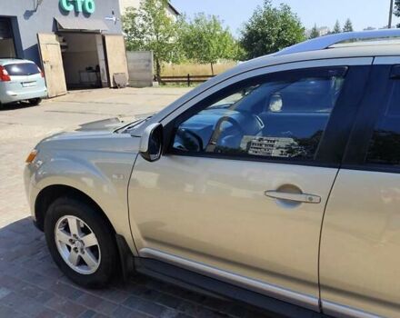 Бежевый Мицубиси Аутлендер, объемом двигателя 2.36 л и пробегом 281 тыс. км за 8500 $, фото 3 на Automoto.ua