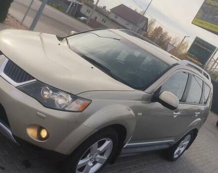 Бежевый Мицубиси Аутлендер, объемом двигателя 2.36 л и пробегом 200 тыс. км за 8300 $, фото 6 на Automoto.ua