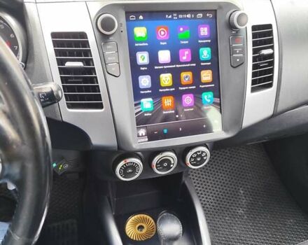 Бежевый Мицубиси Аутлендер, объемом двигателя 2.36 л и пробегом 281 тыс. км за 8500 $, фото 15 на Automoto.ua