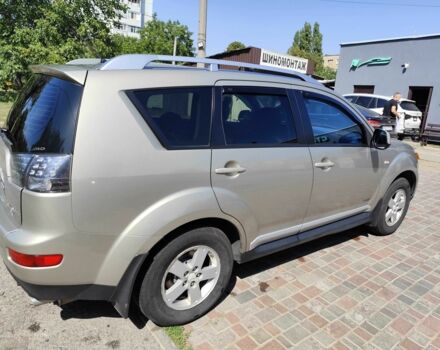 Бежевий Міцубісі Аутлендер, об'ємом двигуна 2.4 л та пробігом 281 тис. км за 8500 $, фото 6 на Automoto.ua