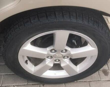 Бежевый Мицубиси Аутлендер, объемом двигателя 2.36 л и пробегом 200 тыс. км за 8300 $, фото 47 на Automoto.ua