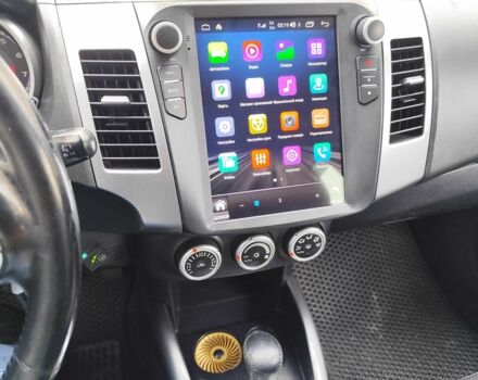 Бежевий Міцубісі Аутлендер, об'ємом двигуна 2.4 л та пробігом 281 тис. км за 8500 $, фото 15 на Automoto.ua