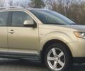 Бежевый Мицубиси Аутлендер, объемом двигателя 2.36 л и пробегом 200 тыс. км за 8300 $, фото 1 на Automoto.ua