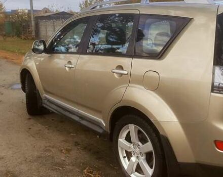 Бежевий Міцубісі Аутлендер, об'ємом двигуна 2.36 л та пробігом 240 тис. км за 9250 $, фото 1 на Automoto.ua