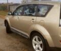 Бежевий Міцубісі Аутлендер, об'ємом двигуна 2.36 л та пробігом 240 тис. км за 9250 $, фото 1 на Automoto.ua