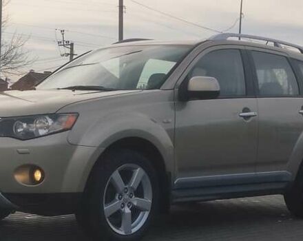 Бежевый Мицубиси Аутлендер, объемом двигателя 2.36 л и пробегом 200 тыс. км за 8300 $, фото 5 на Automoto.ua