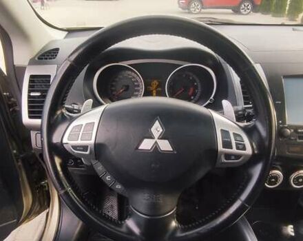 Бежевый Мицубиси Аутлендер, объемом двигателя 2.36 л и пробегом 200 тыс. км за 8300 $, фото 18 на Automoto.ua