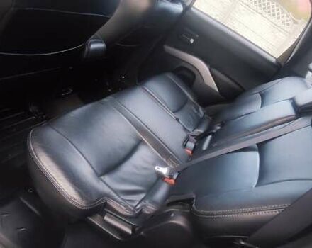 Бежевий Міцубісі Аутлендер, об'ємом двигуна 2.36 л та пробігом 240 тис. км за 9250 $, фото 8 на Automoto.ua