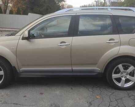 Бежевий Міцубісі Аутлендер, об'ємом двигуна 2.36 л та пробігом 190 тис. км за 9700 $, фото 6 на Automoto.ua