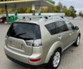 Бежевий Міцубісі Аутлендер, об'ємом двигуна 2 л та пробігом 370 тис. км за 4500 $, фото 6 на Automoto.ua