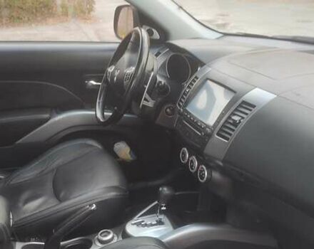 Бежевий Міцубісі Аутлендер, об'ємом двигуна 2.36 л та пробігом 190 тис. км за 9700 $, фото 10 на Automoto.ua