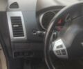 Бежевий Міцубісі Аутлендер, об'ємом двигуна 2.36 л та пробігом 190 тис. км за 9700 $, фото 8 на Automoto.ua