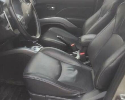 Бежевий Міцубісі Аутлендер, об'ємом двигуна 2.36 л та пробігом 190 тис. км за 9700 $, фото 7 на Automoto.ua