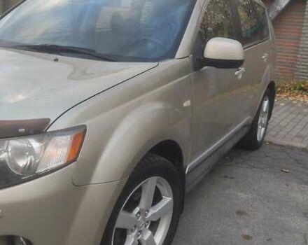 Бежевий Міцубісі Аутлендер, об'ємом двигуна 2.36 л та пробігом 190 тис. км за 9700 $, фото 13 на Automoto.ua