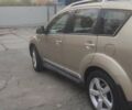 Бежевий Міцубісі Аутлендер, об'ємом двигуна 2.36 л та пробігом 190 тис. км за 9700 $, фото 5 на Automoto.ua