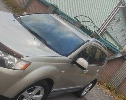 Бежевий Міцубісі Аутлендер, об'ємом двигуна 2.36 л та пробігом 190 тис. км за 9700 $, фото 1 на Automoto.ua