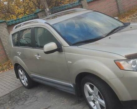 Бежевий Міцубісі Аутлендер, об'ємом двигуна 2.36 л та пробігом 190 тис. км за 9700 $, фото 2 на Automoto.ua