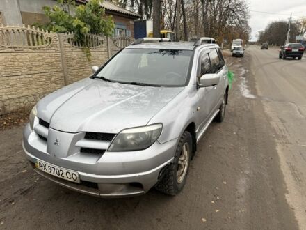 Бежевий Міцубісі Аутлендер, об'ємом двигуна 2 л та пробігом 500 тис. км за 2200 $, фото 1 на Automoto.ua