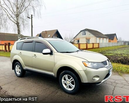 Бежевый Мицубиси Аутлендер, объемом двигателя 2.4 л и пробегом 107 тыс. км за 9900 $, фото 1 на Automoto.ua