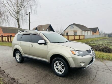 Бежевый Мицубиси Аутлендер, объемом двигателя 2.4 л и пробегом 107 тыс. км за 9900 $, фото 1 на Automoto.ua