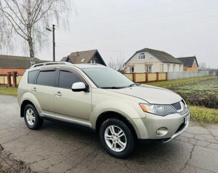 Бежевый Мицубиси Аутлендер, объемом двигателя 2.4 л и пробегом 107 тыс. км за 9900 $, фото 1 на Automoto.ua