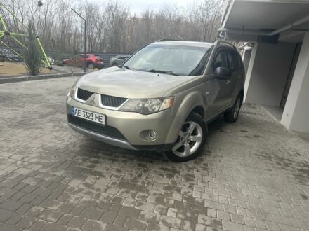 Бежевый Мицубиси Аутлендер, объемом двигателя 2.4 л и пробегом 290 тыс. км за 6950 $, фото 1 на Automoto.ua