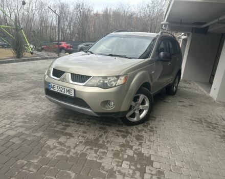 Бежевый Мицубиси Аутлендер, объемом двигателя 2.4 л и пробегом 290 тыс. км за 6950 $, фото 1 на Automoto.ua