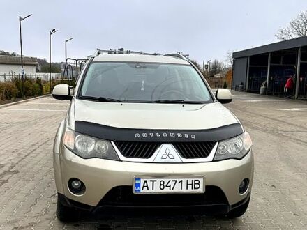 Бежевий Міцубісі Аутлендер, об'ємом двигуна 2.4 л та пробігом 270 тис. км за 8500 $, фото 1 на Automoto.ua