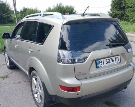 Бежевий Міцубісі Аутлендер, об'ємом двигуна 2.4 л та пробігом 156 тис. км за 9219 $, фото 1 на Automoto.ua