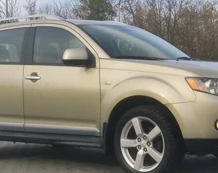 Бежевий Міцубісі Аутлендер, об'ємом двигуна 2.36 л та пробігом 200 тис. км за 8300 $, фото 1 на Automoto.ua
