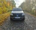Чорний Міцубісі Аутлендер, об'ємом двигуна 2 л та пробігом 301 тис. км за 7600 $, фото 1 на Automoto.ua